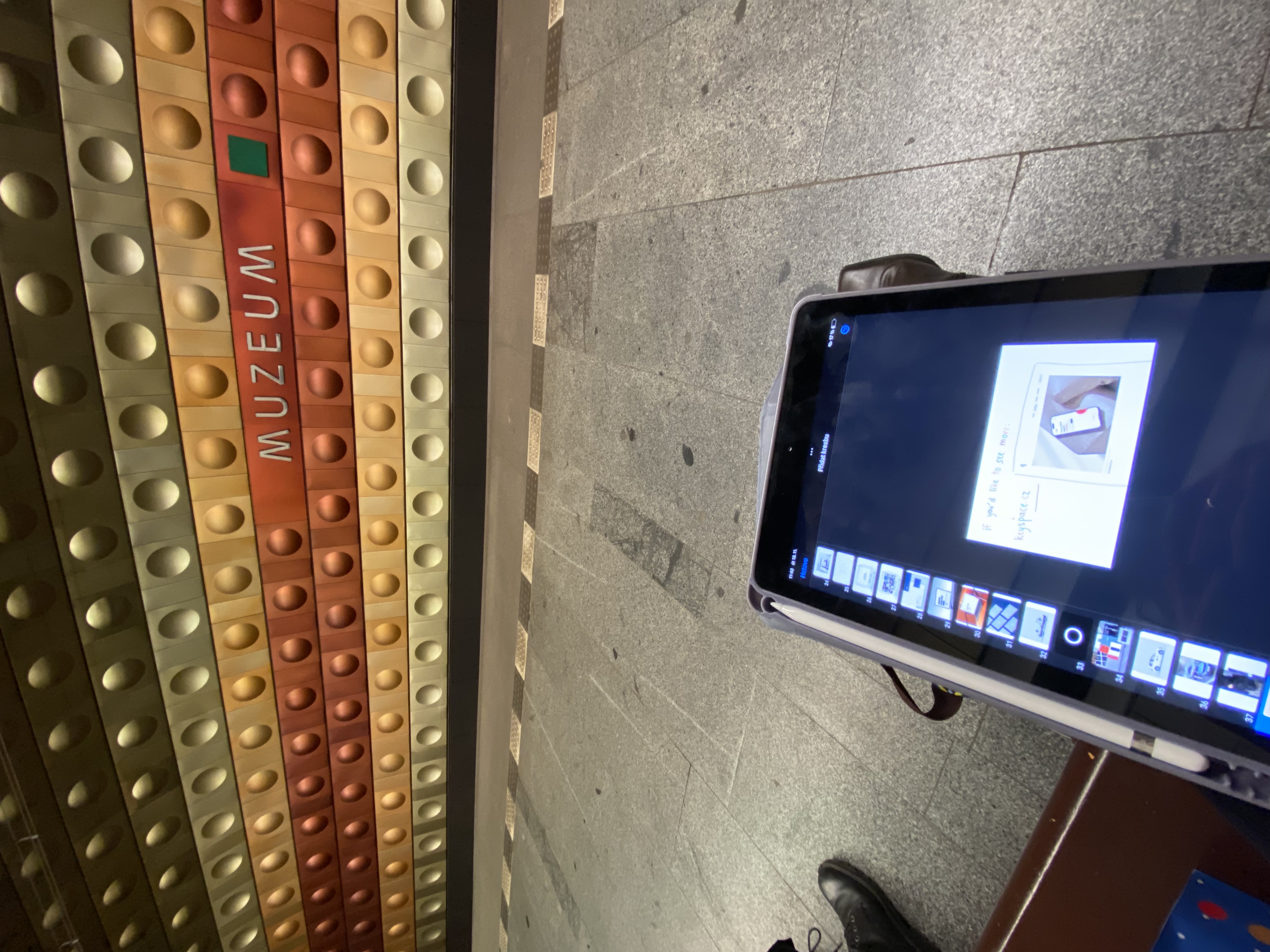 Photo of an ipad in the metro station Muzeum.