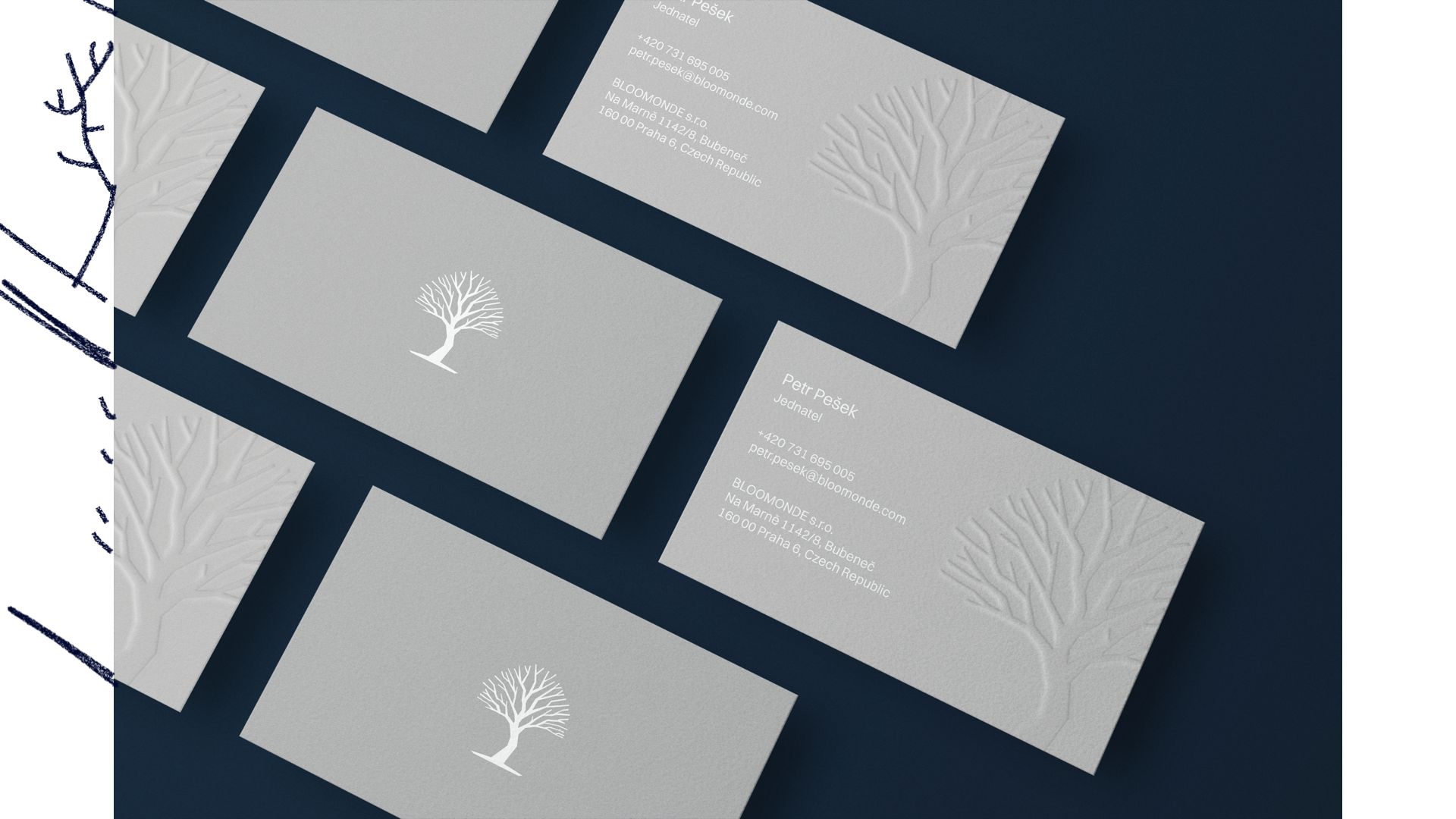 slide 32. Grey business cards with a white tree on them.